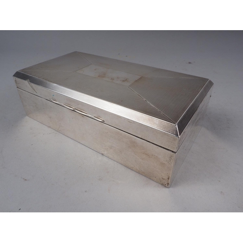 299 - A silver engine turned cigarette box, 6 1/2