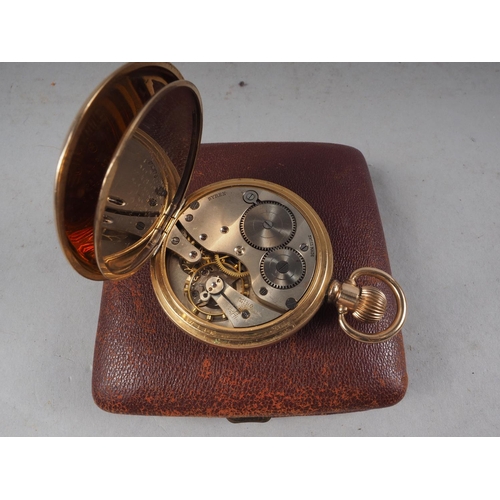 307 - A rolled gold cased pocket watch, in leather easel travelling case