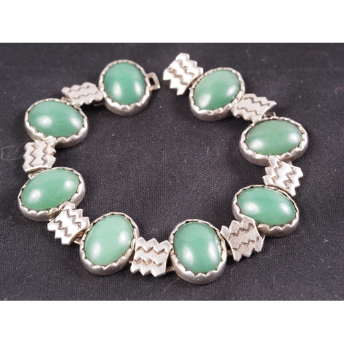 308 - A silver and jade cabochon bracelet