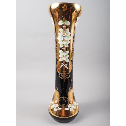 33 - A Bohemian blue glass, gilt and high relief floral decorated vase, 16