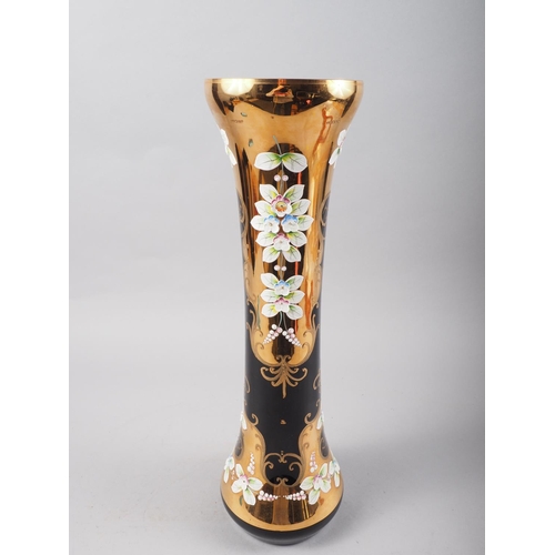 33 - A Bohemian blue glass, gilt and high relief floral decorated vase, 16