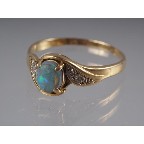 341 - A yellow metal ring, stamped K 18, set black opal doublet and rose diamond shoulders, size O 1/2, 3g... 