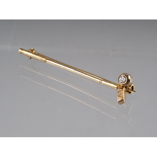 343 - A 9ct gold tie pin/bar brooch, formed as a golf club, set single diamond, 2.3g gross