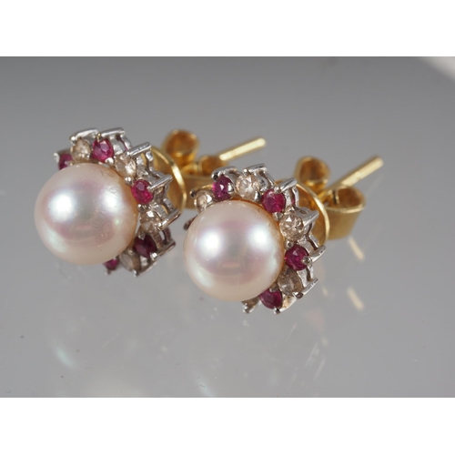 350 - A pair of 18ct pearl, ruby and diamond collar ear studs, pearl 6.7mm dia approx