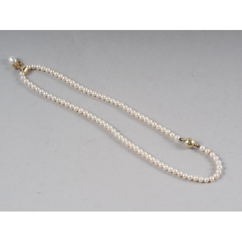 353 - A single row of cultured pearls (ninety approx 4-4.5mm dia) with a single pearl and diamond set gold... 