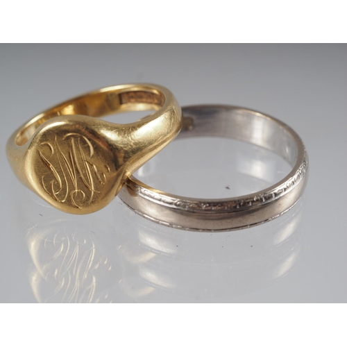 357 - An 18ct gold signet ring, size 'J' 5.3g, and an 18ct gold and white gold wedding band, 3.7g