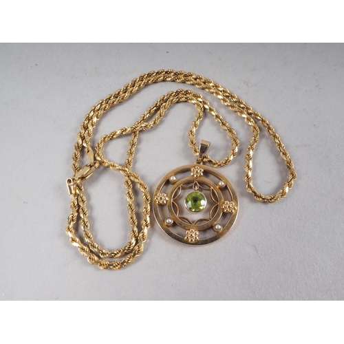 373 - An Italian 9ct gold rope twist chain, and a yellow metal pendant set tourmaline, 16.2g gross