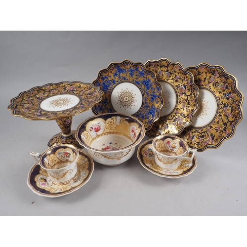 40 - A Coalport part dessert service comprising two shaped dishes with gilt and floral decoration, a simi... 