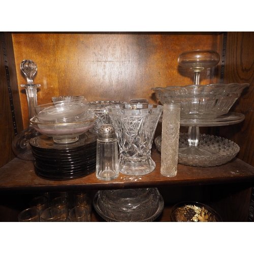 51 - An assortment of glassware, including pedestal glasses, cut glass bowls, a decanter, eleven smokey g... 