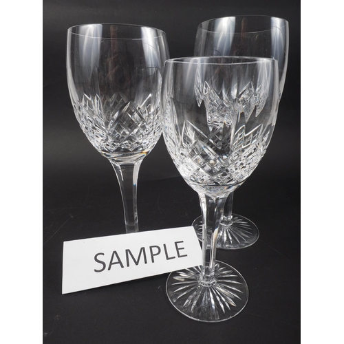 57 - A set of eight cut glass white wine glasses, four matching red wines and three goblets