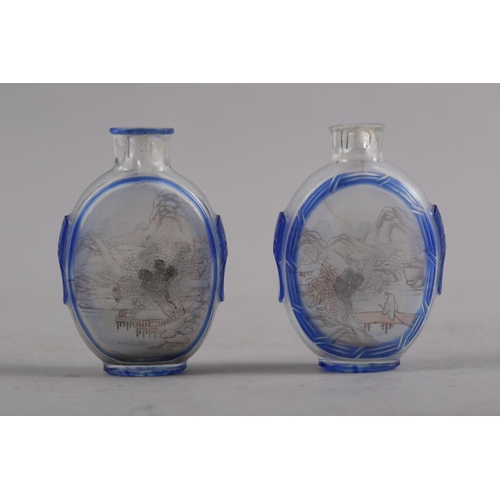 105 - Two Chinese blue and clear glass snuff bottles, 2 1/2