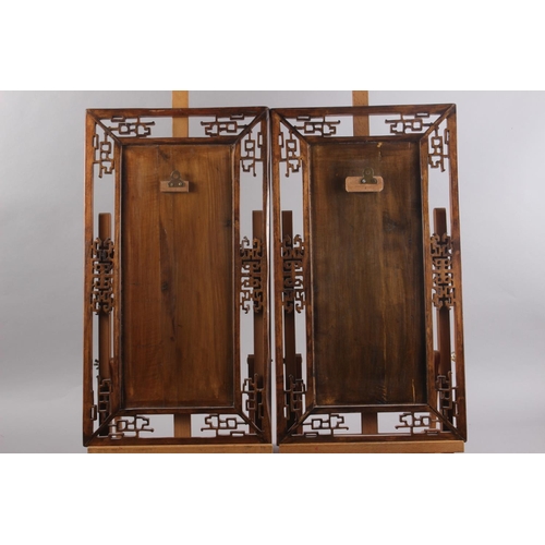 123 - A pair of Chinese carved hardwood panels, studies of bamboo, 23