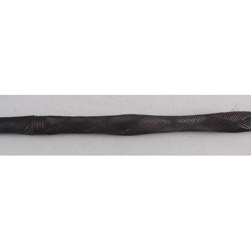 223 - An African geometric carved blackwood stick, 42