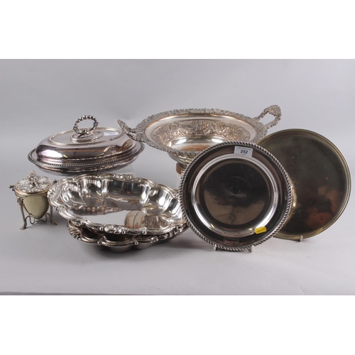 252 - An assortment of silver plate, including a hot plate, a two-handled fruit bowl, a sugar bowl, entree... 