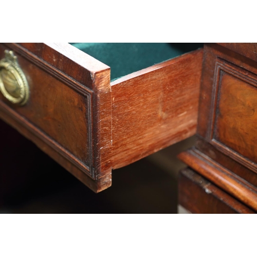 531 - A William IV figured mahogany double pedestal sideboard, fitted three drawers with ring handles over... 