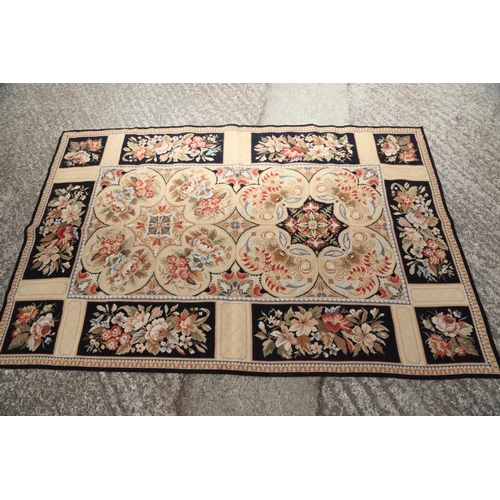 667 - An Aubusson type rug with floral panel designs, 72