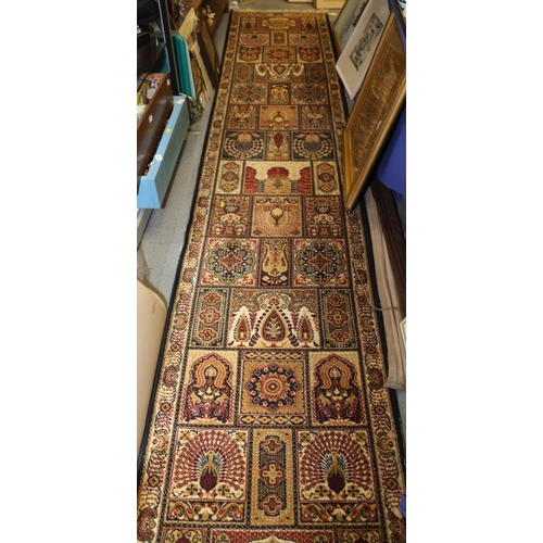 672 - A Persian garden style runner in shades of blue, brown, fawn, green and natural, 134