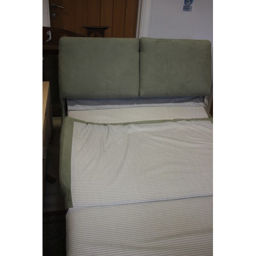 574 - A John Lewis? sofa double bed, upholstered in a green fabric, 48