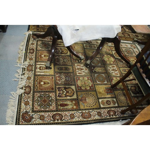 671 - A Persian garden style rug, in shades of blue, brown, fawn, green and natural, 77