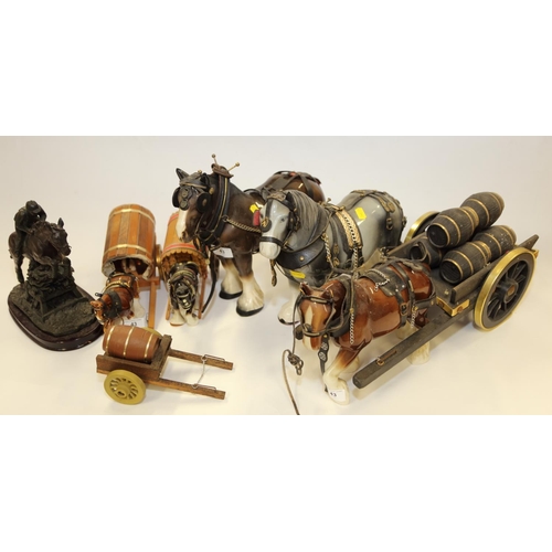 43 - Five ceramic model horses with accessories, including tack and carriages, and a cold cast eventing h... 