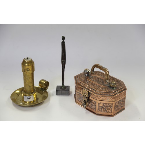 146 - A 19th century brass spring loaded chamberstick, a Middle Eastern copper travelling box, decorated f... 