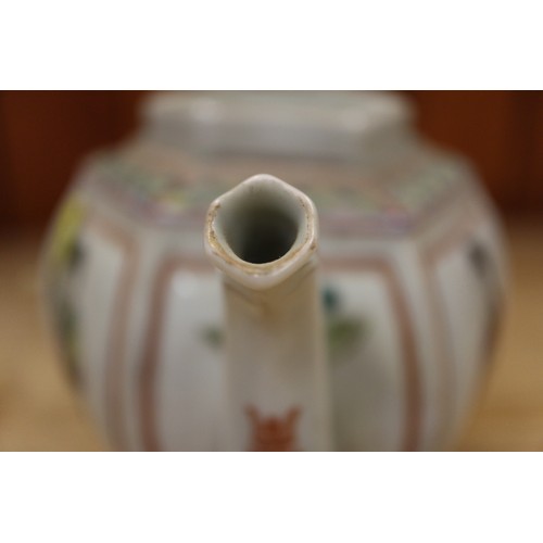 92 - A Chinese hexagonal teapot with polychrome figure decoration and seal mark to base, 5 1/4