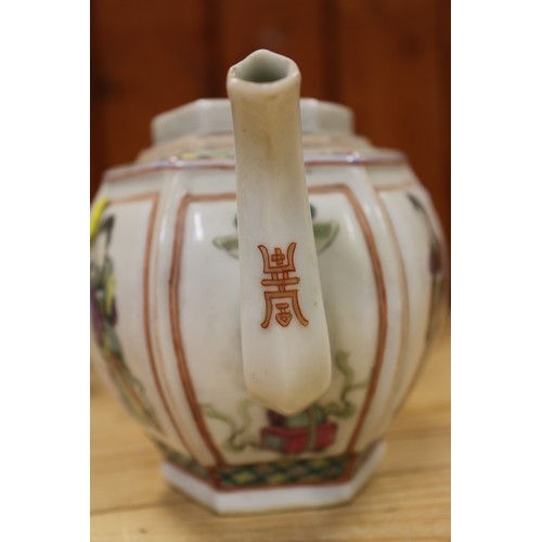 92 - A Chinese hexagonal teapot with polychrome figure decoration and seal mark to base, 5 1/4