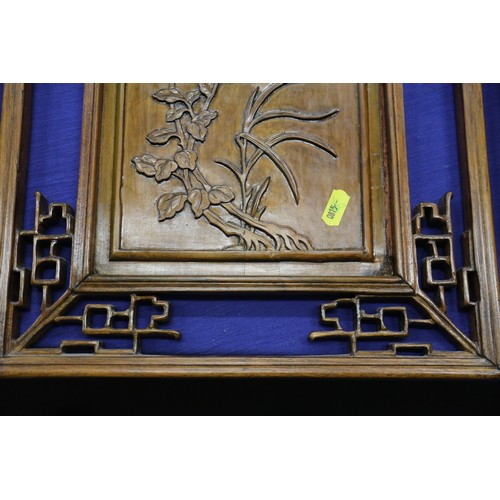 123 - A pair of Chinese carved hardwood panels, studies of bamboo, 23