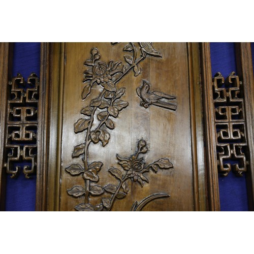 123 - A pair of Chinese carved hardwood panels, studies of bamboo, 23