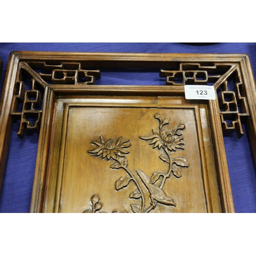 123 - A pair of Chinese carved hardwood panels, studies of bamboo, 23