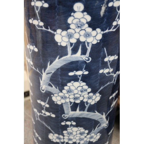 103 - A Chinese blue and white stick stand, decorated cherry blossom, 18