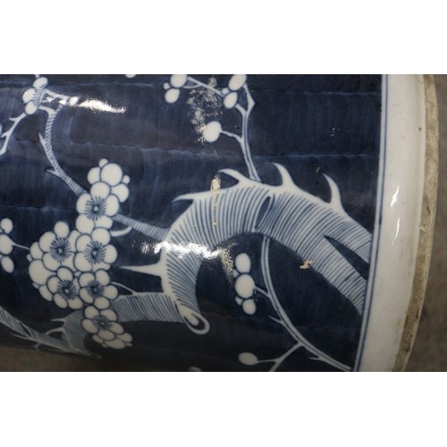 103 - A Chinese blue and white stick stand, decorated cherry blossom, 18