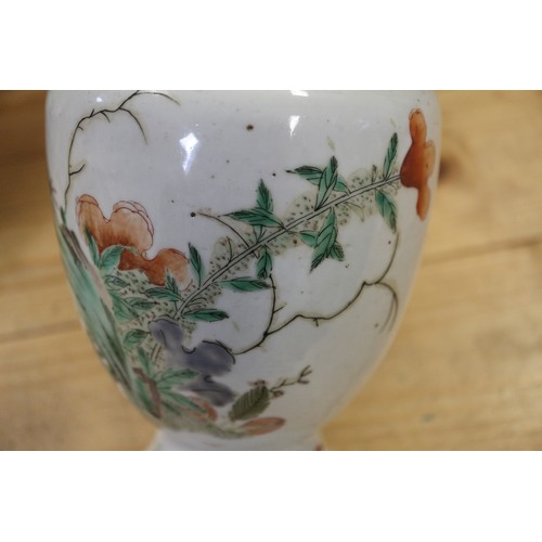 96 - A Chinese baluster vase with floral and insect decoration, 9 1/2