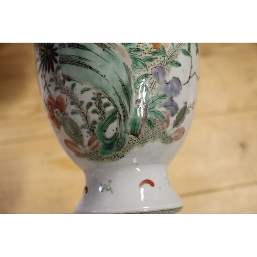 96 - A Chinese baluster vase with floral and insect decoration, 9 1/2