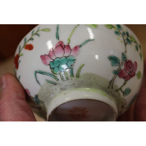 91 - A Chinese bowl with polychrome dragon, phoenix and leaf decoration, 6 1/4