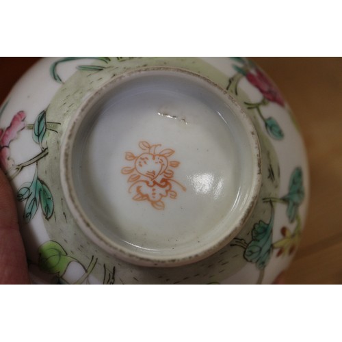 91 - A Chinese bowl with polychrome dragon, phoenix and leaf decoration, 6 1/4