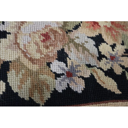 667 - An Aubusson type rug with floral panel designs, 72