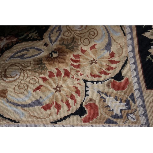 667 - An Aubusson type rug with floral panel designs, 72