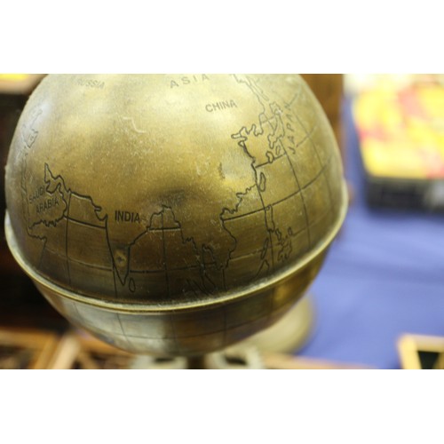 128 - A patinated brass hand-operated sun, earth and moon orrery, 18