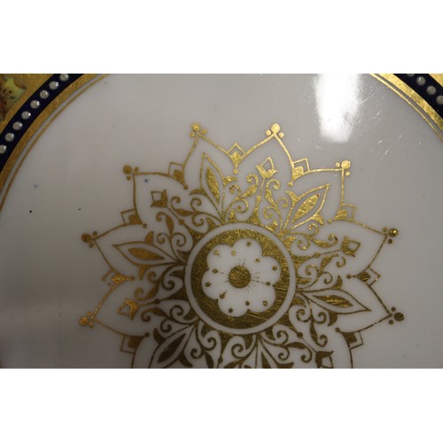 40 - A Coalport part dessert service comprising two shaped dishes with gilt and floral decoration, a simi... 