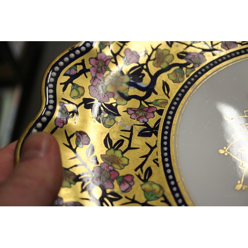 40 - A Coalport part dessert service comprising two shaped dishes with gilt and floral decoration, a simi... 