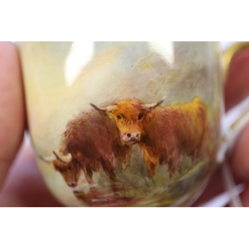 23 - A Royal Worcester cabinet cup, decorated cows, by Harry Stinton (chip to base), a similar cabinet sa... 