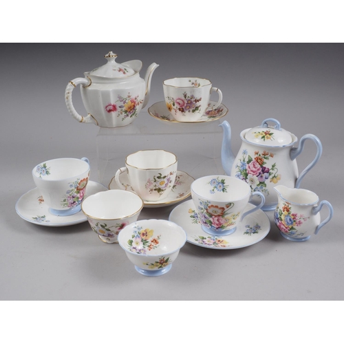 66 - A Shelley bone china floral decorated cabaret teaset and a similar 