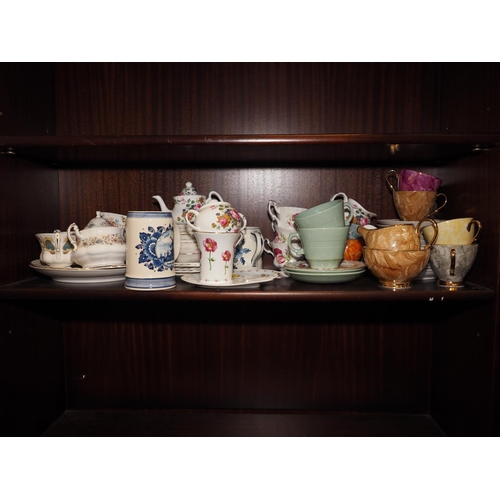 82 - A Harlequin teaset and other assorted teawares