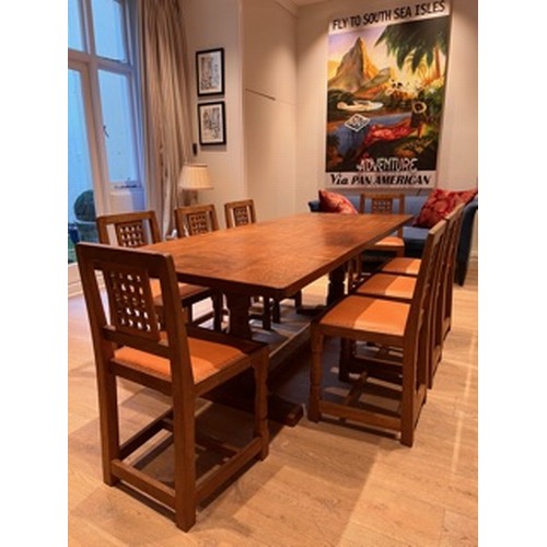 739 - A set of eight Mouseman Thompson oak lattice back standard dining chairs with leather seats, on face... 