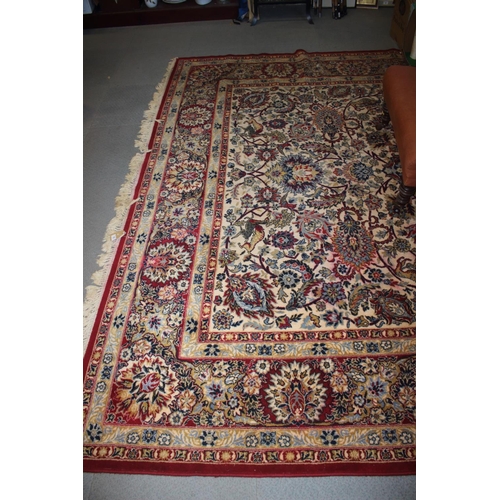 750 - A Kashan super wool pile carpet of traditional Persian design with all-over scrolls and animals on a... 