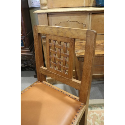 739 - A set of eight Mouseman Thompson oak lattice back standard dining chairs with leather seats, on face... 