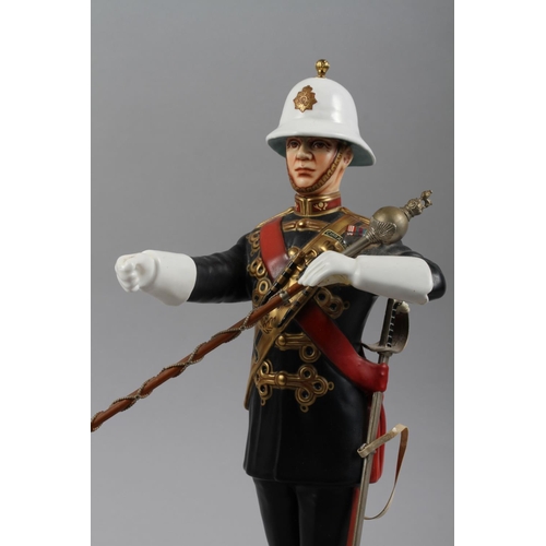 6 - A Michael Sutty limited edition porcelain model of the Royal Marines drum major, 168/250, 12 1/4