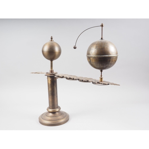 125 - A 1920s Anglo-Indian design patinated brass hand-operated sun, earth and moon orrery, 18