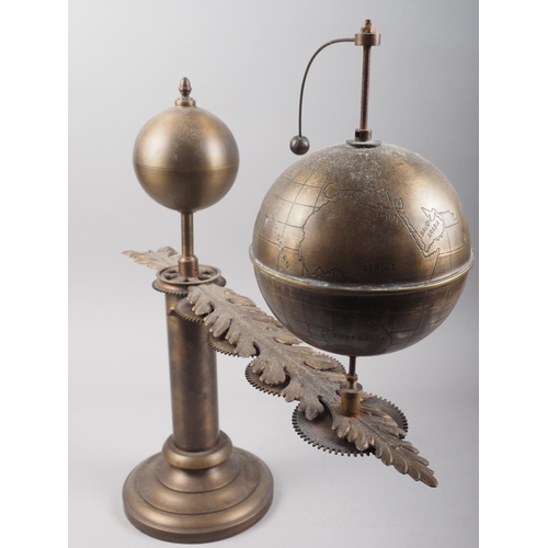 125 - A 1920s Anglo-Indian design patinated brass hand-operated sun, earth and moon orrery, 18